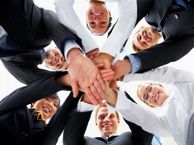 Hands in during a group huddle